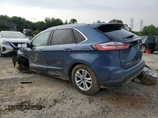 2019 Ford Edge SEL with VIN 2FMPK3J96KBC24295, listed as a Copart auction lot 59392235 with 112,075 mi miles and Salvage title. Bid and sale history available at DreamBid. Image 2.