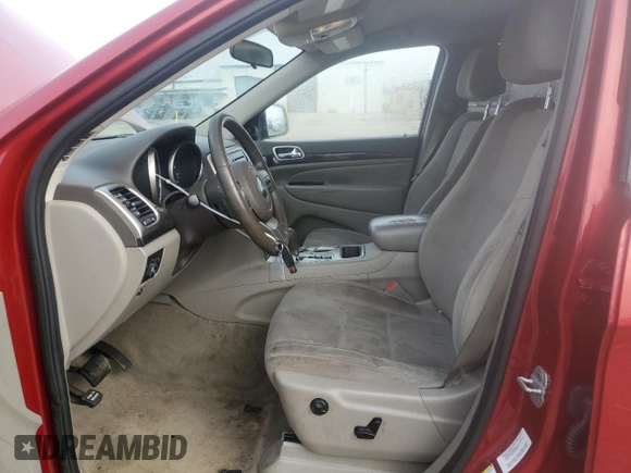 2011 Jeep Grand Cherokee Laredo with VIN 1J4RS4GG6BC704212, listed as a Copart auction lot 83753234 with 200,104 mi miles and Salvage Title. Bid and sale history available at DreamBid. Image 7.