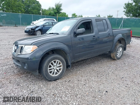 2015 Nissan Frontier SL with VIN 1N6AD0EV1FN764719, listed as a IAAI auction lot 42512771 with 104,572 mi miles and . Bid and sale history available at DreamBid. Image 18.