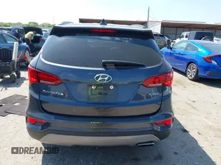 2017 Hyundai Santa Fe 2.4L z VIN 5XYZU3LB4HG462058, wystawiony jako IAAI lot #41861190 z przebiegiem 87 102 mil mil oraz . Historia ofert i sprzedaży dostępna na DreamBid. Obrazek 16.