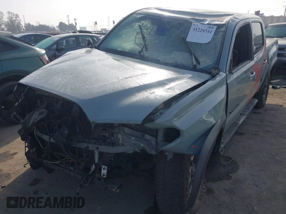 2022 Toyota Tacoma SR with VIN 3TYCZ5AN2NT096491, listed as a IAAI auction lot 42093897 with 47,041 mi miles and . Bid and sale history available at DreamBid. Image 6.