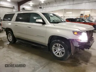 2017 Chevrolet Suburban LT with VIN 1GNSKHKC3HR381480, listed as a Copart auction lot 53789925 with 142,392 mi miles and Salvage Title. Bid and sale history available at DreamBid. Image 4.