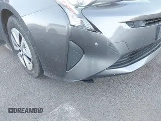 2018 Toyota Prius Two with VIN JTDKBRFU6J3582025, listed as a IAAI auction lot 41681244 with 77,504 mi miles and . Bid and sale history available at carsss.com. Image 6.