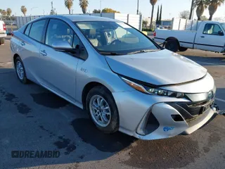2021 Toyota Prius LE with VIN JTDKAMFP1M3196066, listed as a IAAI auction lot 41752179 with 90,200 mi miles and . Bid and sale history available at DreamBid. Image 1.