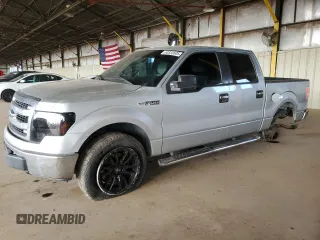 2012 Ford F-150 XL with VIN 1FTFW1EF1CKE10648, listed as a Copart auction lot 63333505 with 160,764 mi miles and Salvage title. Bid and sale history available at DreamBid. Image 1.