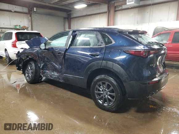 2023 Mazda CX-30 S with VIN 3MVDMBAM1PM565897, listed as a Copart auction lot 52426115 with 19,648 mi miles and Salvage title. Bid and sale history available at DreamBid. Image 2.