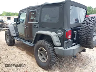 2015 Jeep Wrangler Unlimited Rubicon с VIN 1C4BJWFG4FL566862, выставлен на аукционе IAAI как лот 42310901 с пробегом 146 206 миль миль и . История ставок и продаж доступна на DreamBid. Изображение 3.