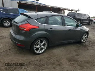 2016 Ford Focus Titanium z VIN 1FADP3N27GL329026, wystawiony jako Copart lot #60910475 z przebiegiem 98 794 mil mil oraz Szkoda całkowita • Salvage title. Historia ofert i sprzedaży dostępna na DreamBid. Obrazek 3.