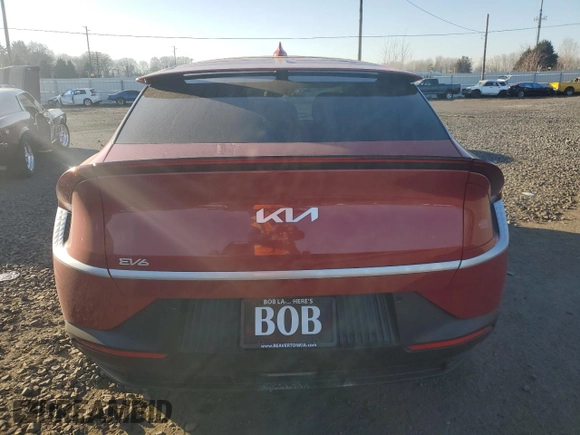 2024 Kia EV6 Wind with VIN KNDC3DLC7R5211410, listed as a Copart auction lot 43232975 with 2,457 mi miles and Salvage Title. Bid and sale history available at carsss.com. Image 6.