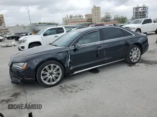 2014 Audi A8 3.0T z VIN WAURGAFD6EN011403, wystawiony jako Copart lot #51237905 z przebiegiem 235 836 mil mil oraz Szkody całkowita. Historia ofert i sprzedaży dostępna na DreamBid. Obrazek 1.
