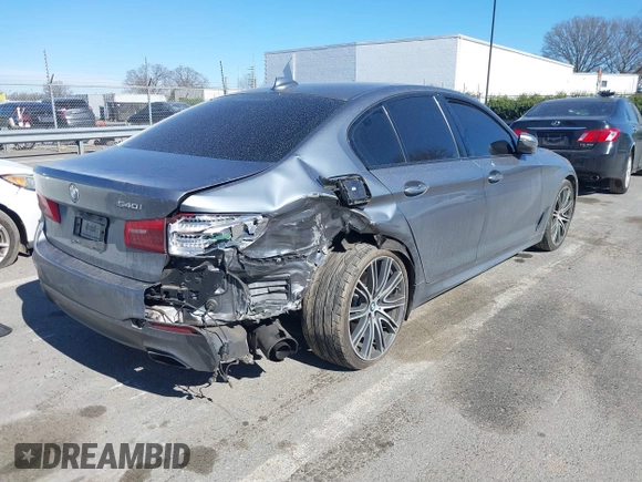 2018 BMW 5 Series 540i with VIN WBAJE5C59JWA96901, listed as a IAAI auction lot 41690919 with 67,395 mi miles and . Bid and sale history available at carsss.com. Image 4.