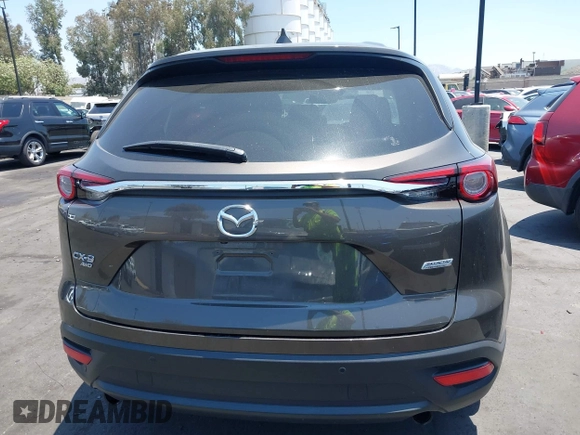2017 Mazda CX-9 Touring with VIN JM3TCBCY1H0131233, listed as a IAAI auction lot 42490137 with 84,216 mi miles and . Bid and sale history available at DreamBid. Image 16.