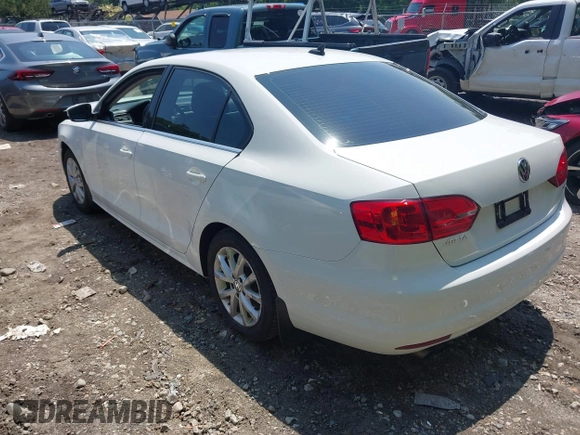 2014 Volkswagen Jetta SE with VIN 3VWD17AJ5EM437072, listed as a IAAI auction lot 42463048 with 99,030 mi miles and . Bid and sale history available at DreamBid. Image 3.