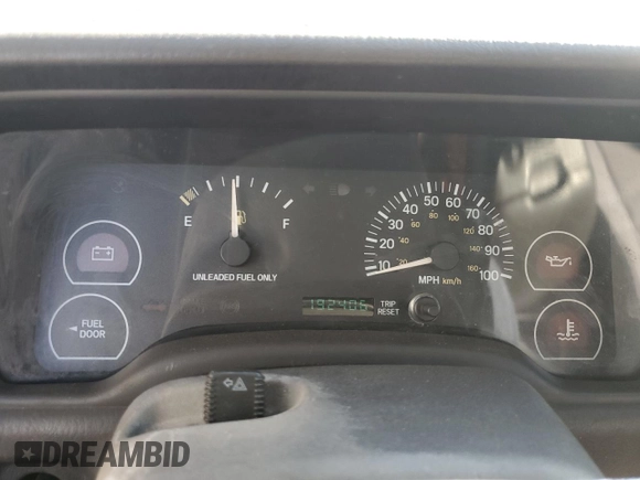 1999 Jeep Cherokee SE with VIN 1J4FT28S6XL515896, listed as a Copart auction lot 83745444 with 192,406 mi miles and Salvage title. Bid and sale history available at DreamBid. Image 9.