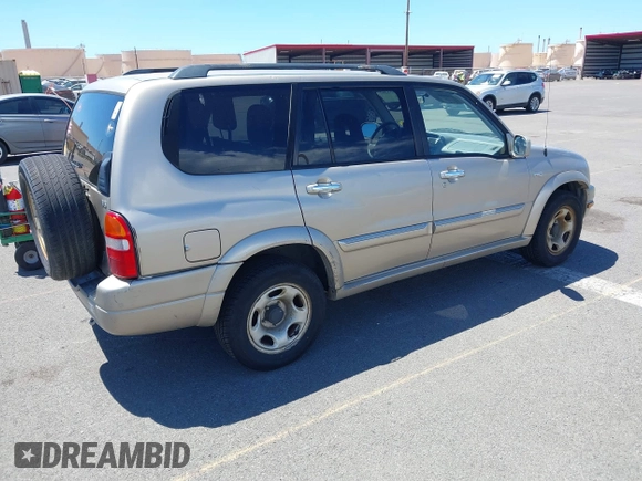 2002 Suzuki XL-7 with VIN JS3TY92V724105263, listed as a IAAI auction lot 41858262 with 103,249 mi miles. Bid and sale history available at carsss.com. Image 4.