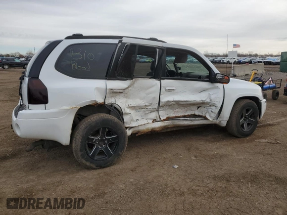 2004 GMC Envoy SLT with VIN 1GKDT13S442158660, listed as a Copart auction lot 50190045 with 0 mi miles and Salvage Title. Bid and sale history available at carsss.com. Image 3.