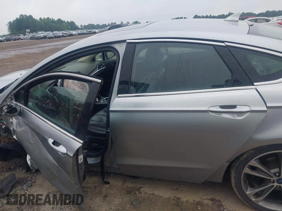 2020 Ford Fusion Titanium with VIN 3FA6P0D99LR138127, listed as a IAAI auction lot 42439024 with 128,792 mi miles and . Bid and sale history available at DreamBid. Image 15.