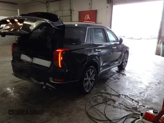 2021 Hyundai Palisade Limited z VIN KM8R5DHE3MU197952, wystawiony jako IAAI lot #41574649 z przebiegiem 105 342 mil mil oraz . Historia ofert i sprzedaży dostępna na DreamBid. Obrazek 4.