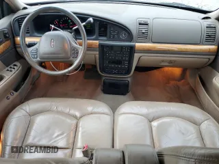 2001 Lincoln Continental with VIN 1LNHM97V41Y633841, listed as a Copart auction lot 86695664 with 166,931 mi miles and Salvage Title. Bid and sale history available at carsss.com. Image 8.
