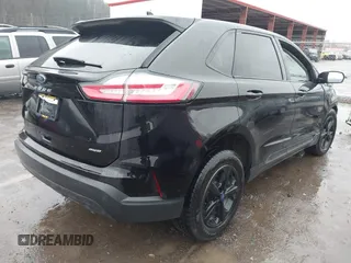 2021 Ford Edge SE with VIN 2FMPK4G99MBA22681, listed as a IAAI auction lot 41576016 with 92,457 mi miles and . Bid and sale history available at DreamBid. Image 4.