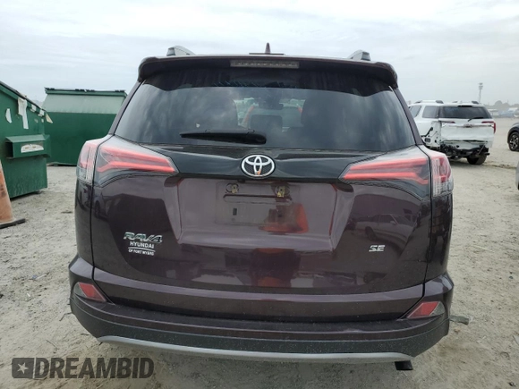 2018 Toyota RAV4 SE with VIN 2T3NFREV8JW444933, listed as a Copart auction lot 55832085 with 75,445 mi miles and Salvage title. Bid and sale history available at DreamBid. Image 6.