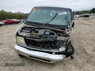 1999 Ford Econoline Passenger XL with VIN 1FBSS31L2XHB54786, listed as a Copart auction lot 80025474 with 418,665 mi miles and Clean Title. Bid and sale history available at DreamBid. Image 12.