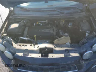 2012 Chevrolet Sonic LTZ z VIN 1G1JE6SH2C4126197, wystawiony jako Copart lot #85541214 z przebiegiem Nie podano mil oraz Szkoda całkowita • Salvage title. Historia ofert i sprzedaży dostępna na DreamBid. Obrazek 12.