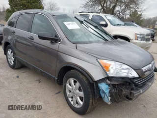 2009 Honda CR-V EX with VIN 5J6RE48509L036518, listed as a IAAI auction lot 42074174 with Not Provided miles and . Bid and sale history available at carsss.com. Image 1.