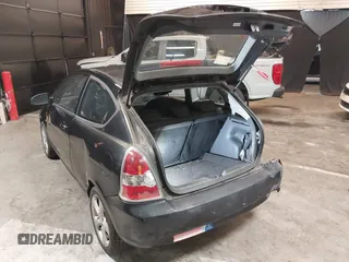 2007 Hyundai Accent SE with VIN KMHCN36C67U026540, listed as a IAAI auction lot 41062633 with 70,143 mi miles. Bid and sale history available at carsss.com. Image 3.