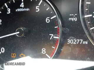 2022 Mazda CX-30 S Carbon Edition with VIN 3MVDMBCL6NM410330, listed as a IAAI auction lot 42107426 with 30,277 mi miles and . Bid and sale history available at DreamBid. Image 16.