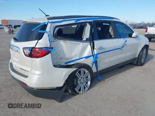 2013 Chevrolet Traverse LT z VIN 1GNKRGKD8DJ130025, wystawiony jako IAAI lot #41696382 z przebiegiem 161 382 mil mil oraz . Historia ofert i sprzedaży dostępna na DreamBid. Obrazek 4.