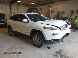 2015 Jeep Cherokee Latitude z VIN 1C4PJMCS9FW633313, wystawiony jako IAAI lot #41952424 z przebiegiem 135 885 mil mil oraz . Historia ofert i sprzedaży dostępna na DreamBid. Obrazek 1.