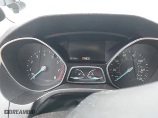 2015 Ford Focus Titanium with VIN 1FADP3N2XFL300859, listed as a IAAI auction lot 41944410 with 76,194 mi miles. Bid and sale history available at carsss.com. Image 7.