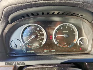 2012 BMW 7 Series 740Li with VIN WBAKB4C59CC576610, listed as a Copart auction lot 62762465 with 128,073 mi miles and Clean title. Bid and sale history available at DreamBid. Image 9.