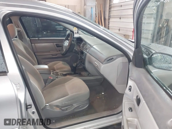 2003 Ford Taurus SES Standard with VIN 1FAFP55U13G222465, listed as a IAAI auction lot 42168336 with 128,078 mi miles. Bid and sale history available at carsss.com. Image 5.