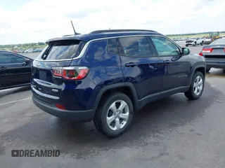 2018 Jeep Compass Latitude with VIN 3C4NJDBB2JT150463, listed as a IAAI auction lot 42452301 with 73,895 mi miles and . Bid and sale history available at DreamBid. Image 4.