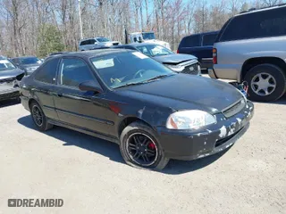 1997 Honda Civic EX with VIN 1HGEJ8245VL054080, listed as a IAAI auction lot 41880386 with 286,568 mi miles. Bid and sale history available at carsss.com. Image 1.
