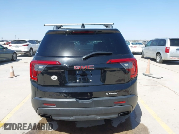 2021 GMC Acadia SLT with VIN 1GKKNMLS7MZ204928, listed as a IAAI auction lot 41719245 with 76,825 mi miles. Bid and sale history available at carsss.com. Image 17.