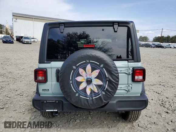 2024 Jeep Wrangler Sport S with VIN 1C4PJXAG2RW335190, listed as a Copart auction lot 51767465 with 2,717 mi miles and Salvage title. Bid and sale history available at DreamBid. Image 6.