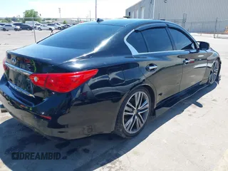 2017 Infiniti Q50 Premium with VIN JN1EV7APXHM737130, listed as a IAAI auction lot 42440909 with 97,461 mi miles and . Bid and sale history available at DreamBid. Image 4.