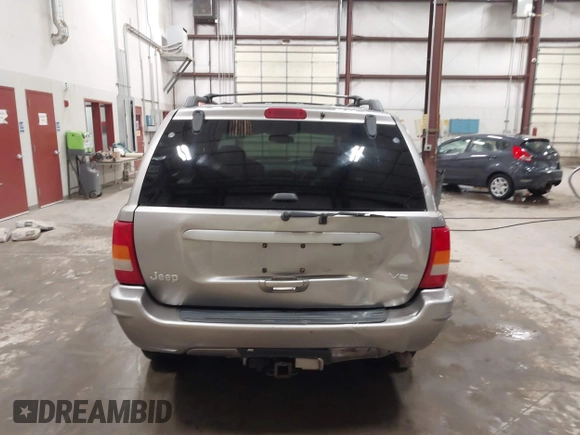 1999 Jeep Grand Cherokee Limited with VIN 1J4GW68N7XC752314, listed as a IAAI auction lot 41776905 with 228,023 mi miles. Bid and sale history available at carsss.com. Image 17.