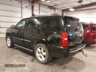 2012 Chevrolet Tahoe LTZ with VIN 1GNSKCE02CR297261, listed as a IAAI auction lot 40255137 with 283,110 mi miles and . Bid and sale history available at DreamBid. Image 3.