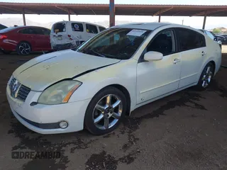 2004 Nissan Maxima SL z VIN 1N4BA41E24C869006, wystawiony jako IAAI lot #42259558 z przebiegiem 97 383 mil mil oraz . Historia ofert i sprzedaży dostępna na DreamBid. Obrazek 2.