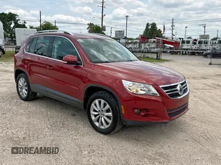 2011 Volkswagen Tiguan SEL w/Premium Navi z VIN WVGAV7AX1BW000384, wystawiony jako Copart lot #59420805 z przebiegiem 166 245 mil mil oraz Czysty tytuł • Clean title. Historia ofert i sprzedaży dostępna na DreamBid. Obrazek 1.