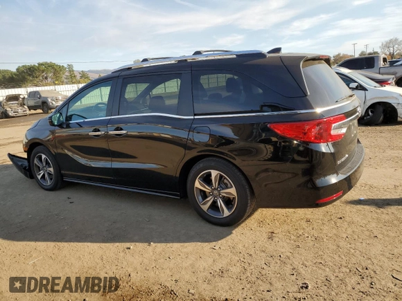 2020 Honda Odyssey Touring with VIN 5FNRL6H87LB007609, listed as a Copart auction lot 84562954 with 22,763 mi miles and Salvage Title. Bid and sale history available at DreamBid. Image 2.