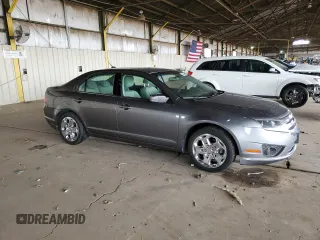 2010 Ford Fusion SE with VIN 3FAHP0HA2AR320858, listed as a Copart auction lot 52054045 with 151,943 mi miles and Salvage Title. Bid and sale history available at DreamBid. Image 4.