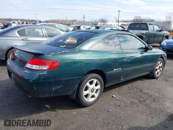 1999 Toyota Solara SE with VIN 2T1CF28P7XC234130, listed as a IAAI auction lot 41714384 with 194,670 mi miles. Bid and sale history available at carsss.com. Image 4.