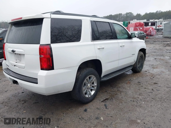 2017 Chevrolet Tahoe LS with VIN 1GNSCAKC3HR265961, listed as a IAAI auction lot 41426651 with 117,331 mi miles and . Bid and sale history available at DreamBid. Image 4.