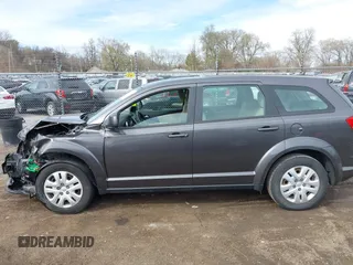 2014 Dodge Journey American Value with VIN 3C4PDCAB7ET151254, listed as a IAAI auction lot 41962026 with 161,115 mi miles and . Bid and sale history available at DreamBid. Image 14.