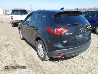 2013 Mazda CX-5 Touring with VIN JM3KE2CE3D0102368, listed as a IAAI auction lot 41783079 with 162,646 mi miles and . Bid and sale history available at carsss.com. Image 3.